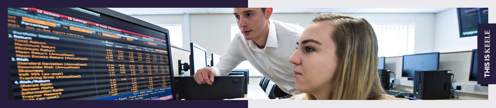 Accounting and Finance students looking at a computer screen