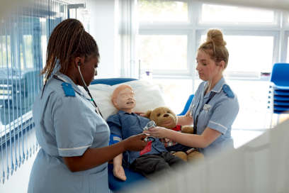 Student nurses undertaking a practical activity as part of their studies.