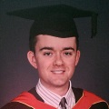 Daniel Murray in graduation cap and gown 