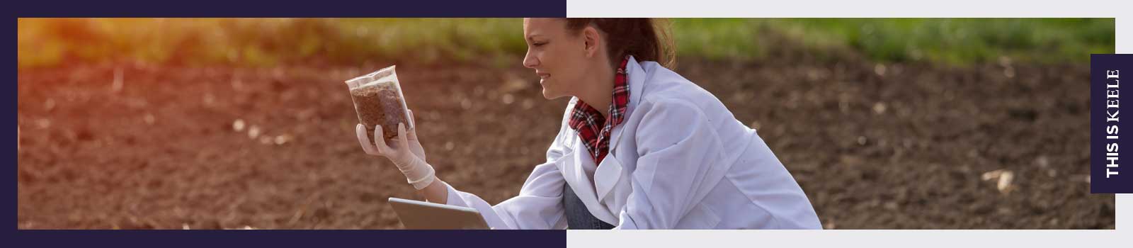Woman holding a soil sample in a field