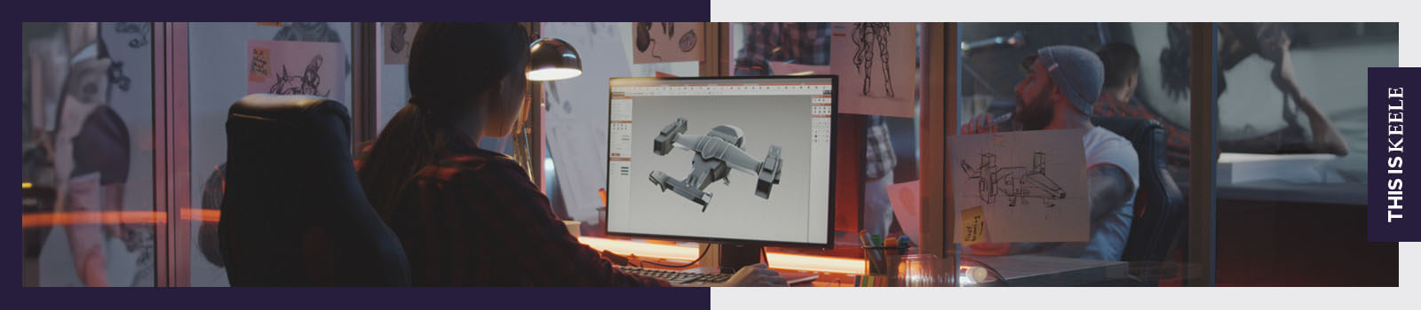 A female computer games designer using a computer.