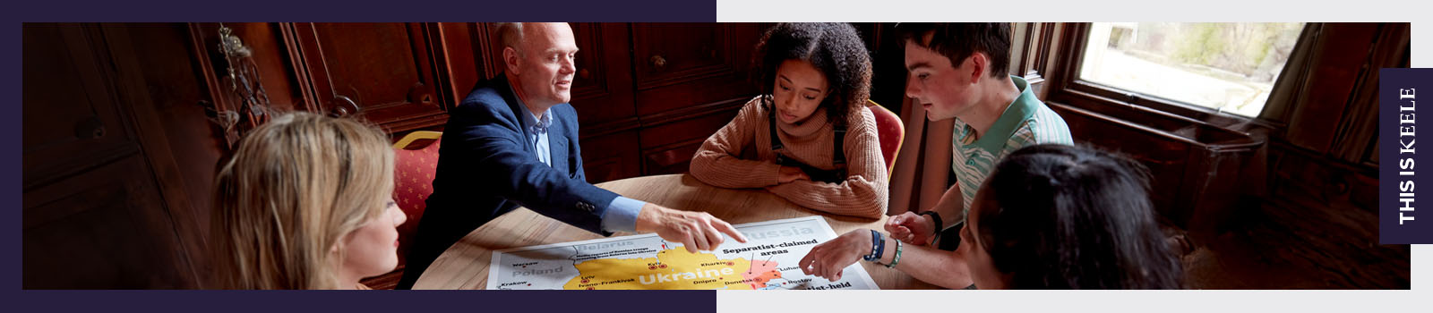 Students having a discussion with an academic