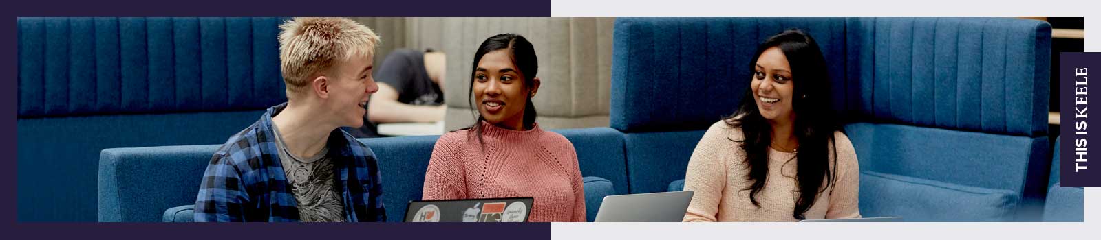 Students sitting with laptops in Smart Innovation Hub