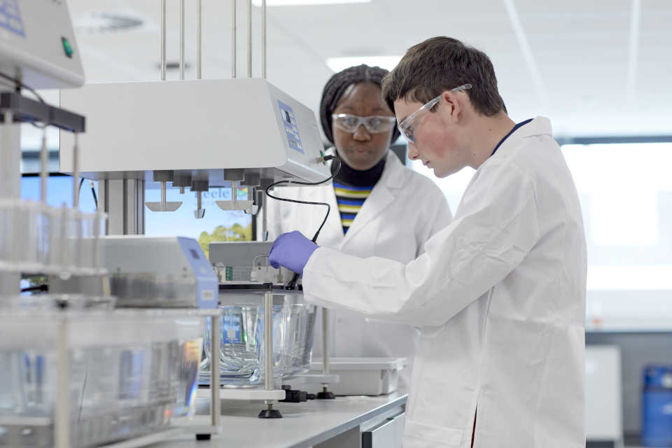 Pharmaceutical Science with Business students in a laboratory